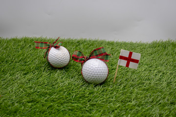 Golf ball with England Flag on green 