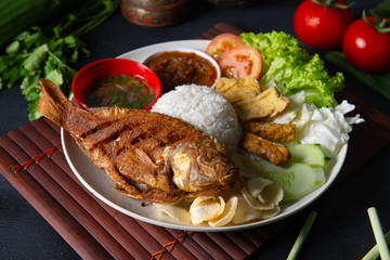 traditional malay indonesian tilapia fish rice