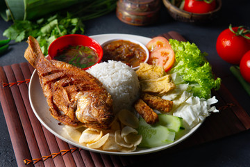 traditional malay indonesian tilapia fish rice