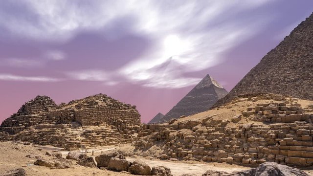 Timelapse with clouds over great pyramids at Giza Cairo in Egypt