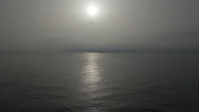 Morning offshore view of Costa de Caparica coast in Almada, Lisbon.Shot by drone in Portugal.