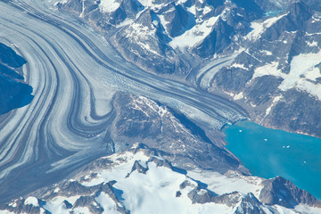 Aerial view of scenic Greenland Glaciers and icebergs © eskystudio