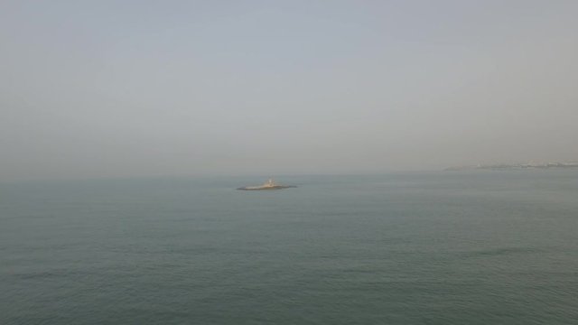 Bugio Lighthouse located on a very small island in the middle of the atlantic ocean. Shot in the morning by drone at Portugal, Lisbon