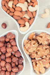 Various nuts and almonds containing healthy natural vitamins and minerals, nutritious eating