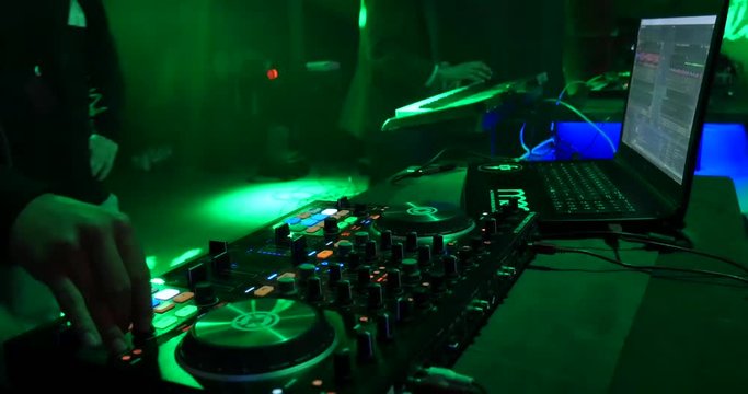 Three DJs at party in 4K.