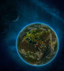 Jordan from space on Earth at night surrounded by space with Moon and Milky Way. Detailed planet with city lights and clouds.