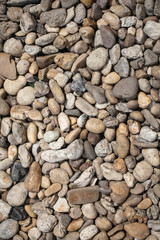 beautiful multi-colored pebbles on the sea, rest