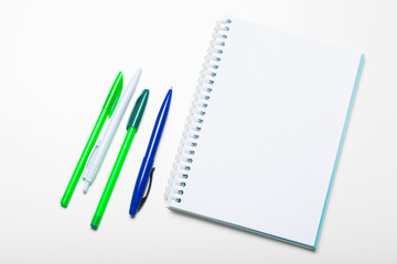 notepad notebook and ball pont pen isolated on white background