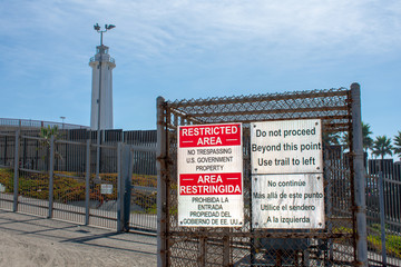 The warning signs on the border wall on the United States - Mexico international border near San...