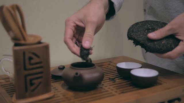 tea ceremony, puer tea leaves, terracota teapot