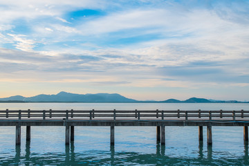 Obraz premium Beautiful bridge in the sea in the sunset is a natural relaxing.