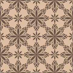 Brown floral ornament on beige background. Seamless pattern
