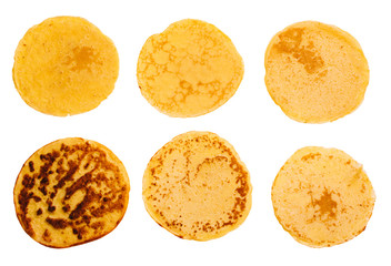Six fried pancakes isolated on white background. Flat lay top-down composition. Maslenitsa