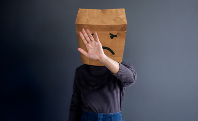 Customer Experience or Human Emotional Concept. Introvert Person. Woman Covered Face by Paper Bag...