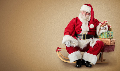 Santa Claus, sled, Christmas gifts and copy space