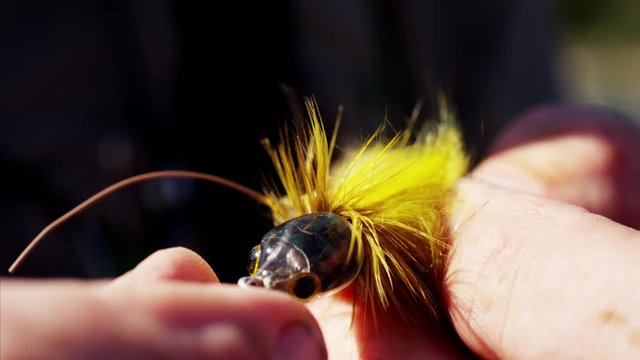 Handmade dry fly made by skilled fisherman outdoor