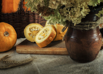 Autumn still life with pumpkin and zucchini