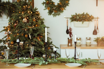 Christmas, holidays and eating concept - table served for festive dinner at home