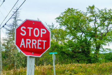 Bilingual stop sign
