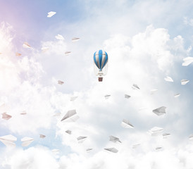 Flying hot air balloon in the air.