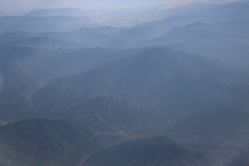 Clear Blue Sky with the Scenery of the Mountain in the Mist