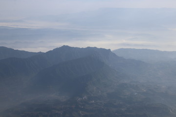 Fototapeta premium Clear Blue Sky with the Scenery of the Mountain in the Mist