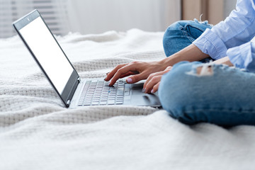 woman working at home on laptop. self employed freelancer. independence and freedom concept.