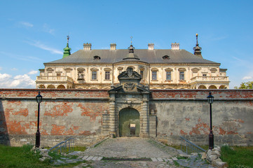 Fototapeta premium Old abandoned castle in Lviv region, Pidhirtsi, Ukraine, since 1635. The view from the front side