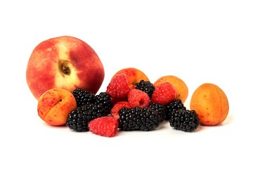 Peach, apricot, BlackBerry and raspberry isolated on white backg