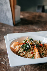 Fusion Pasta spicy Thai Pad Kapraw spaghetti with shrimps and holy basil