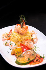 Saute shrimps, scallop, squid with pepper chilli with Mediterranian roast vegetable and saffron rice