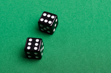 double of gaming bones on a green background