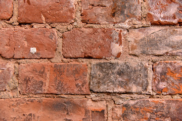 Obraz premium Masonry wall macro bright contrast with the texture of the bricks