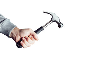 Hammer in hand isolated. Man holding a hammer, tool in the hand.