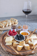 Served table - wine appetizer, cheese assortment