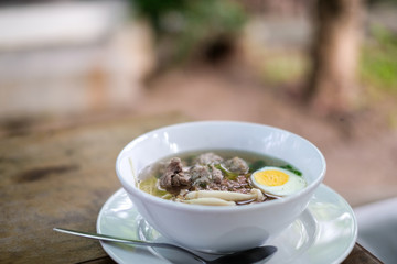 Thai Style Riceberry Soup with pork,egg,mushroom and Ginger
