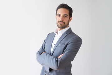 Successful Caucasian businessman posing for magazine front page. Portrait of attractive man in...