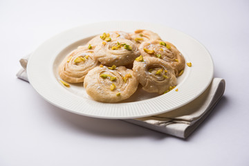 Chirote or Chiroti is a sweet dish from Karnataka and Maharashtra. Served in a plate as a dessert on Festivals or wedding. Selective focus