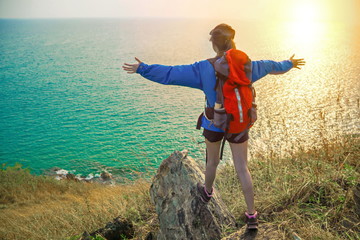 ackpackers are touring and relaxing on the mountain.