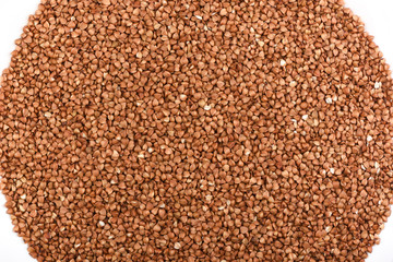 Top view. Buckwheat on a white background. Buckwheat texture