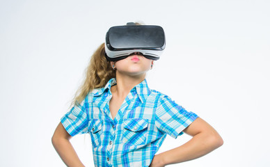 Little girl in virtual reality goggles. kid use modern technology. Little kid in VR headset. Digital future and innovation. Small child wear wireless VR glasses. Working with innovative technologies