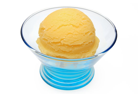 Apricot, mango or Lemon ice cream scoop in bowl isolated on white background