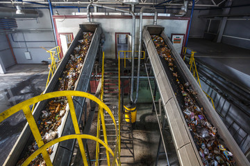 moving conveyor transporter on Modern waste recycling processing plant. Separate and sorting...
