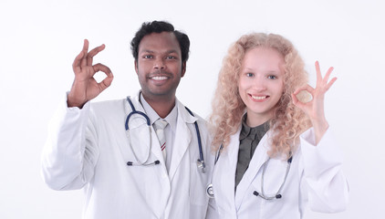 Fototapeta premium two doctors of the medical center showing OK gesture.