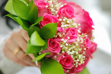 bridal bouquet of fresh roses on the table. wedding floristry, floristic decorative statement