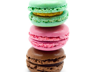 macarons stacked, sweet colorful macarons on white background