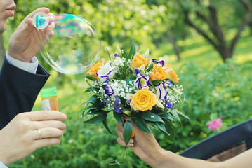 bridal bouquet of fresh roses on the table. wedding floristry, floristic decorative statement