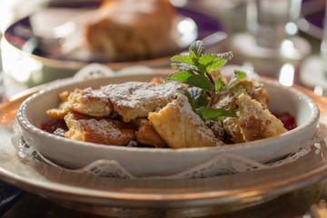 Traditional Austrian sweet pastry kaiserschmarm on plate