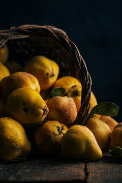 Close up of quince fruits on wooden table