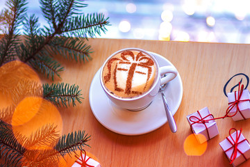 Christmas cappuccino with a gift picture